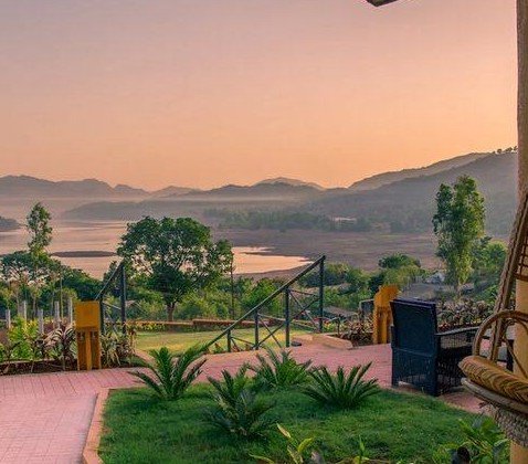 Sunset over Mulshi lake seen from the retreat garden